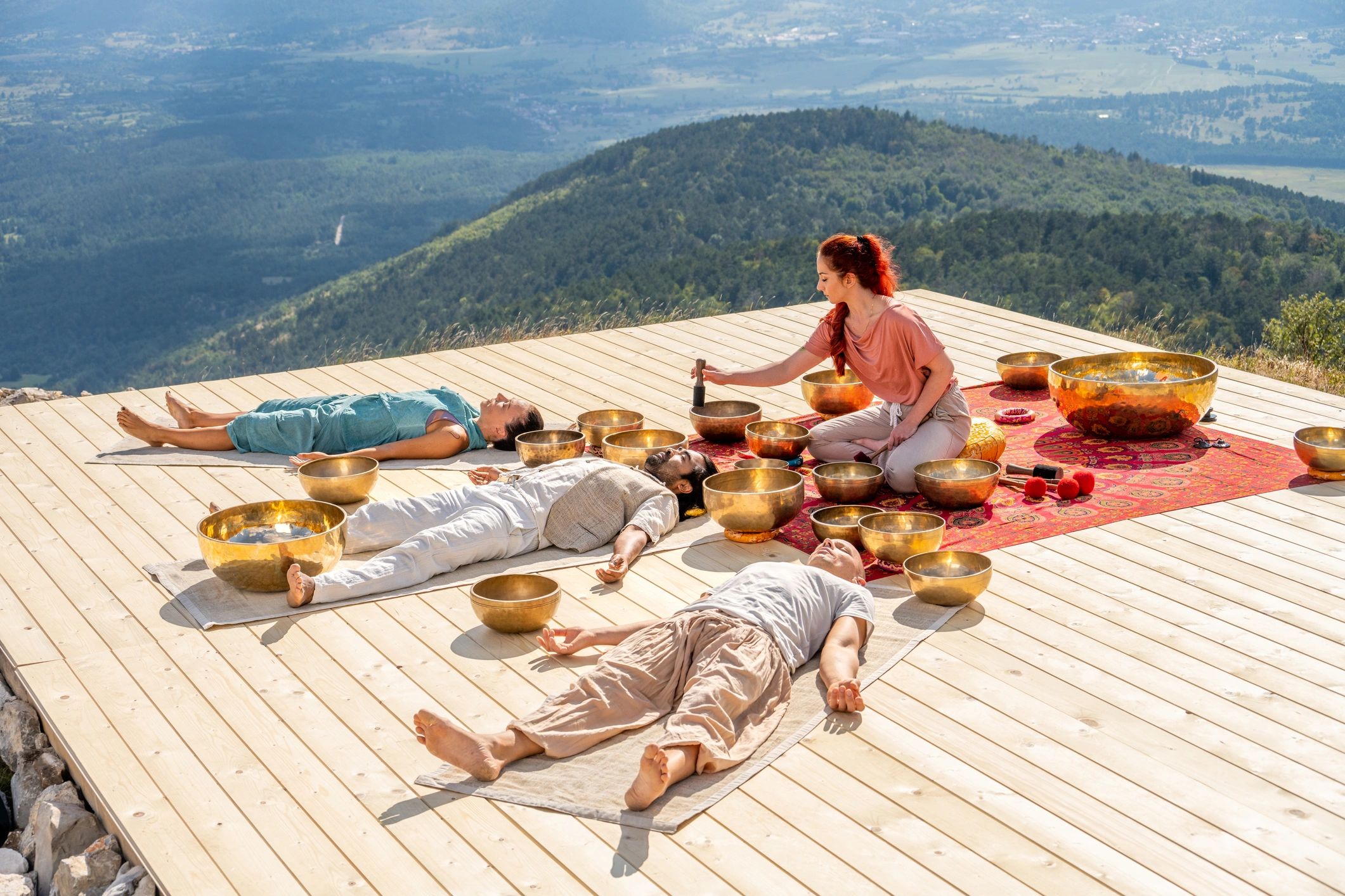 Group sound healing session with singing bowls