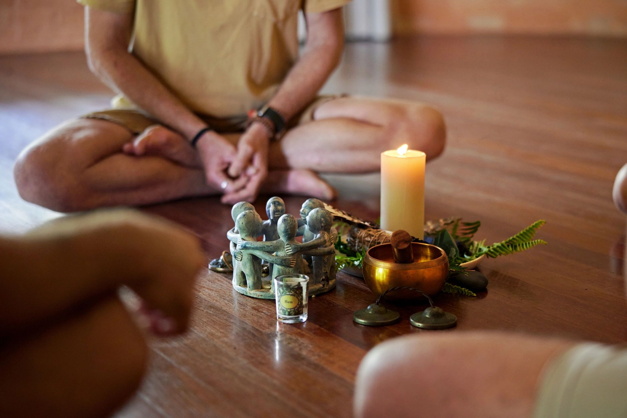 Meditation circle with candles and a singing bowl
