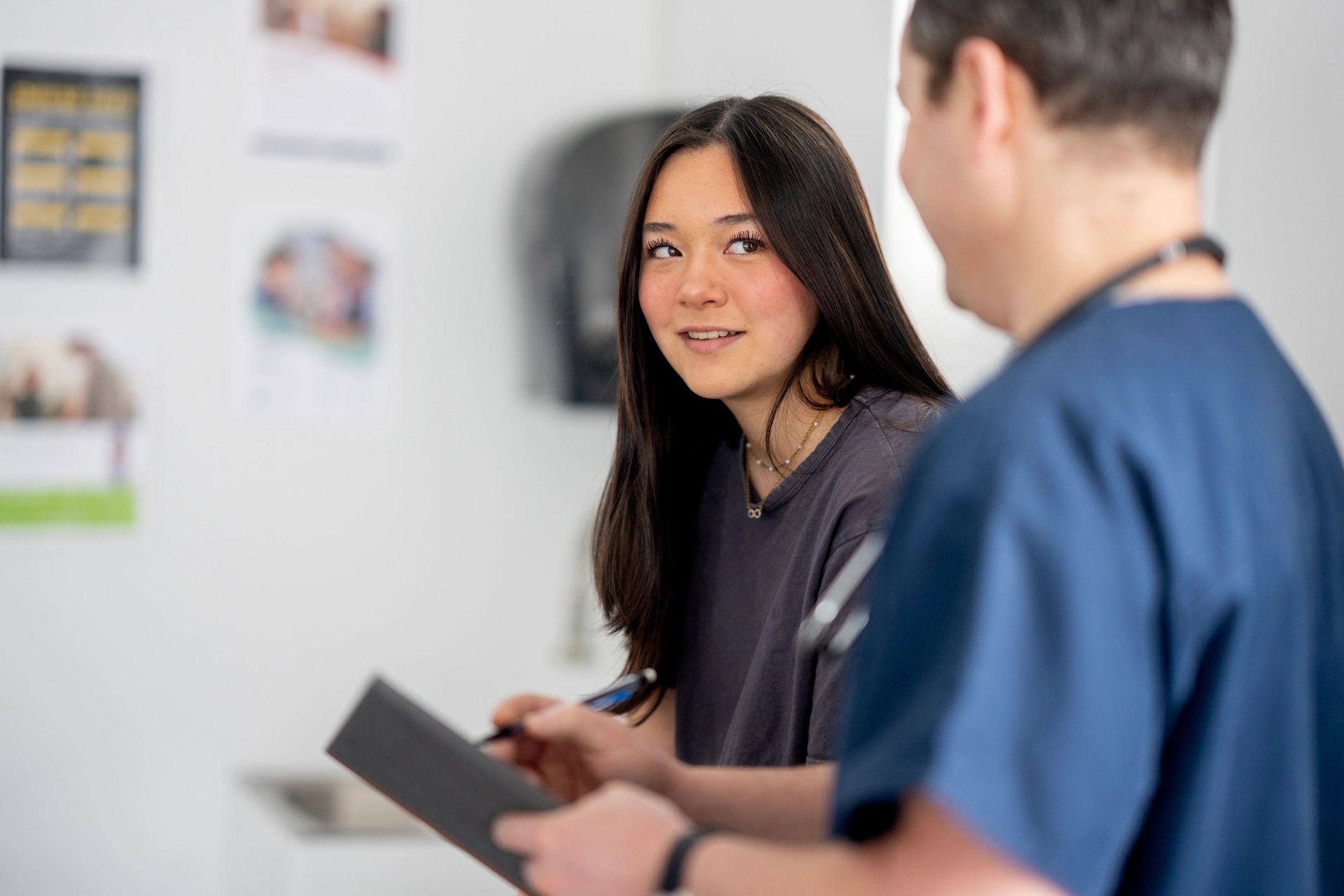 Doctor speaking with a patient during a friendly consultation