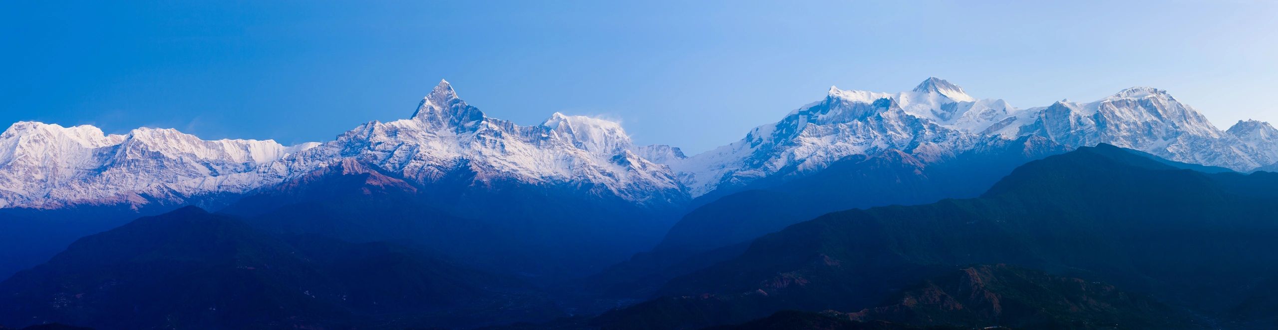 Wide Himalayan mountain range at sunrise